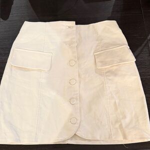 Alya Cream Button-Front Mini Skirt with Flap Pockets